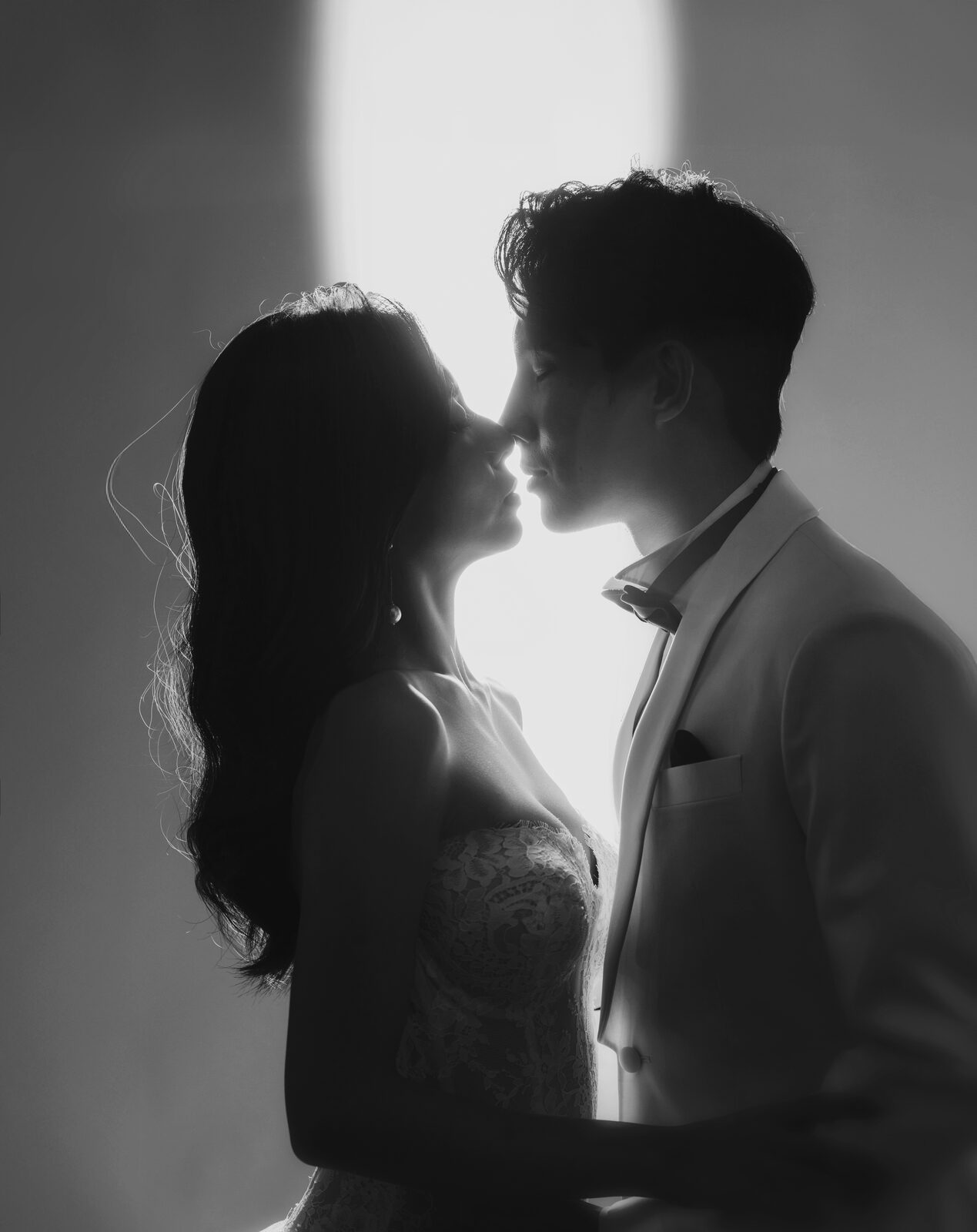 Silhouette of couple kissing